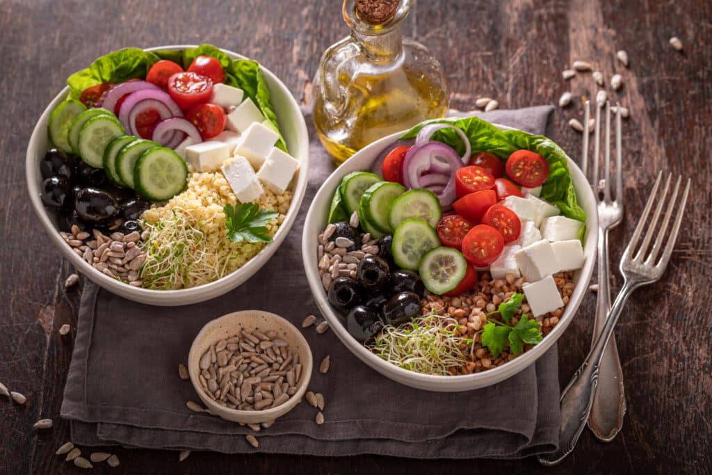 Diet Greek salad in alternative version for people on diet. Nutritious bowl for fit people.